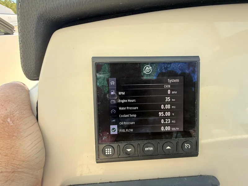 Slide: The Image of Dashboard display of a 2020 Boston Whaler 230 Vantage showing engine metrics. - 37