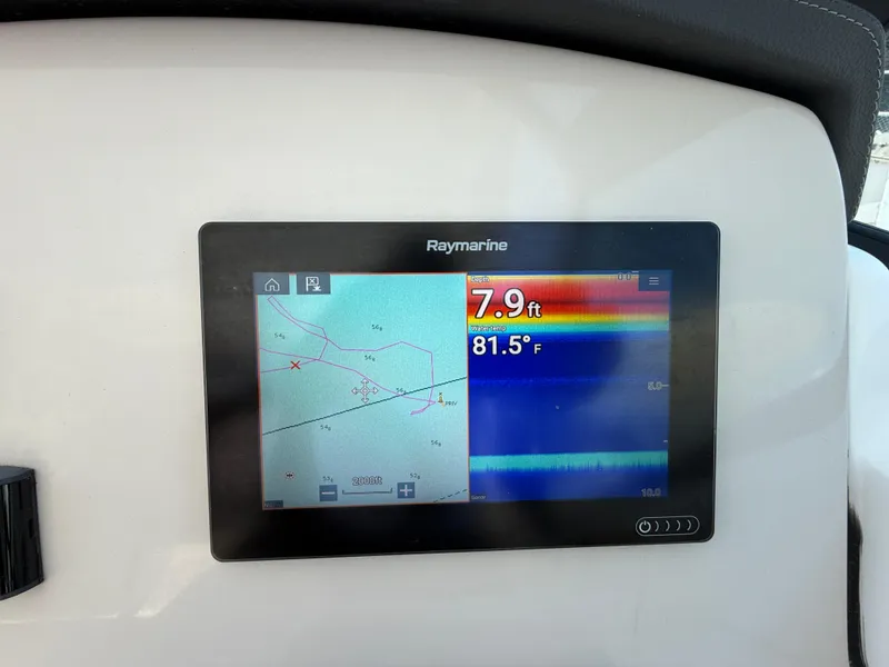 Slide: The Image of Raymarine display on 2020 Boston Whaler 230 Vantage showing depth and temperature. - 39