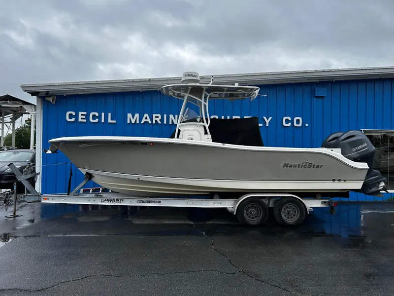 Slide: The Image of 2018 NauticStar 25 XS Offshore boat on trailer at Cecil Marine Supply Co. - 3