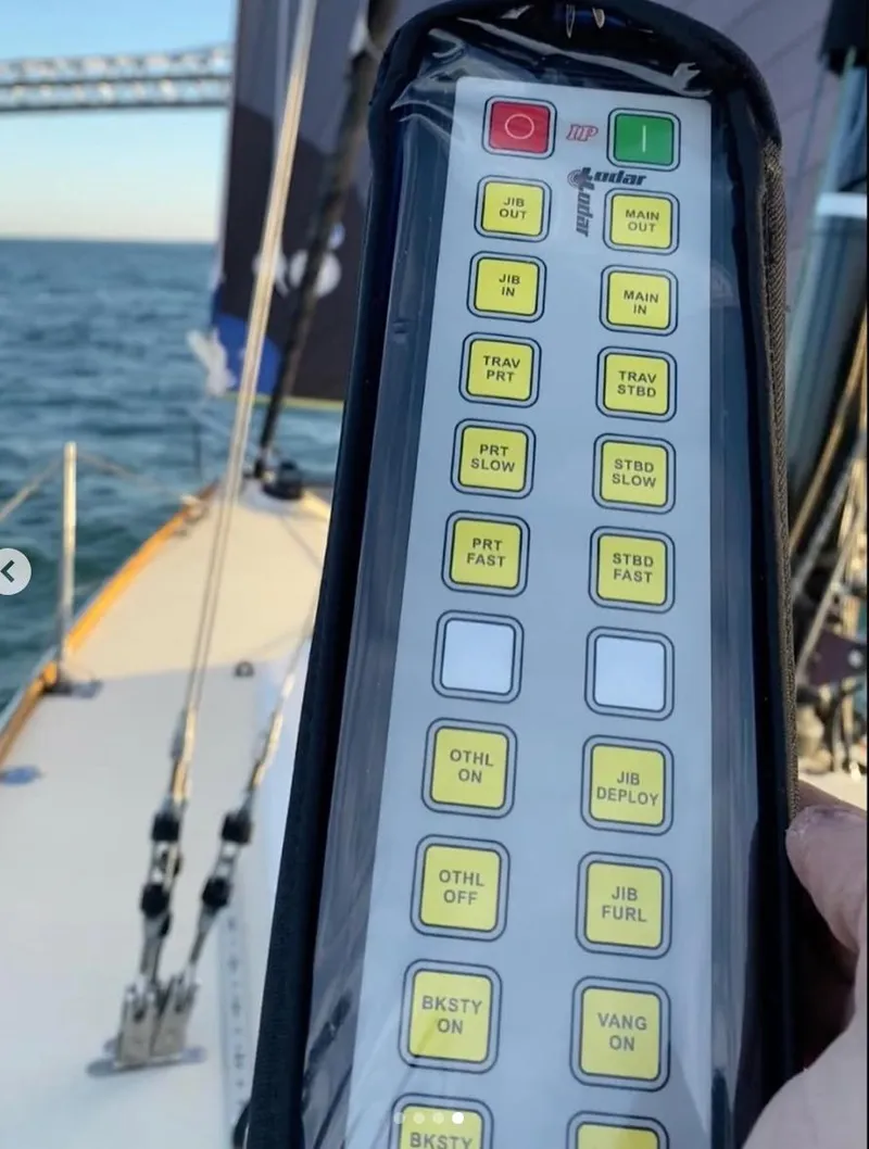 Slide: The Image of Control panel on a 2005 J Boats J/100 sailboat, with ocean and bridge in background. - 3