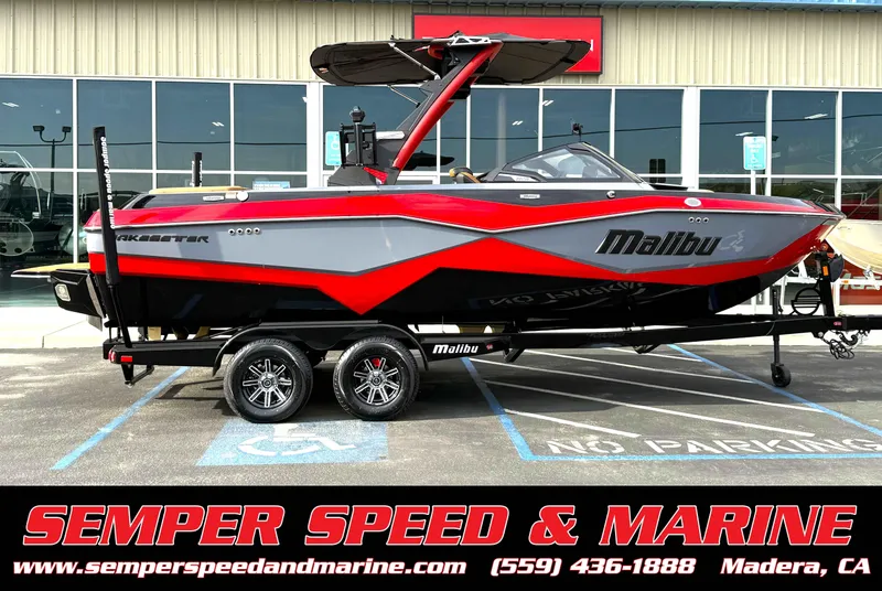 Slide: The Image of 2025 Malibu Wakesetter 22 LSV boat on trailer at Semper Speed & Marine dealership. - 5