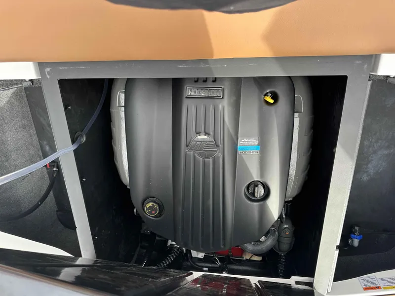 Slide: The Image of Engine compartment of a 2025 Axis T220 boat, showcasing the engine details. - 13