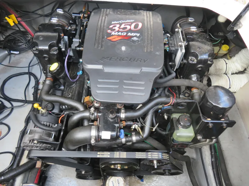 Slide: The Image of MerCruiser 350 MAG MPI engine in a 2004 Monterey 245 Cruiser boat. - 6