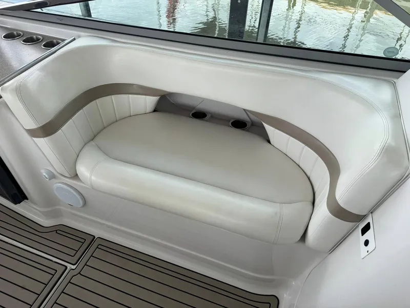 Slide: The Image of Luxurious seating on 2006 Four Winns 290 Horizon boat with cup holders and elegant design. - 21
