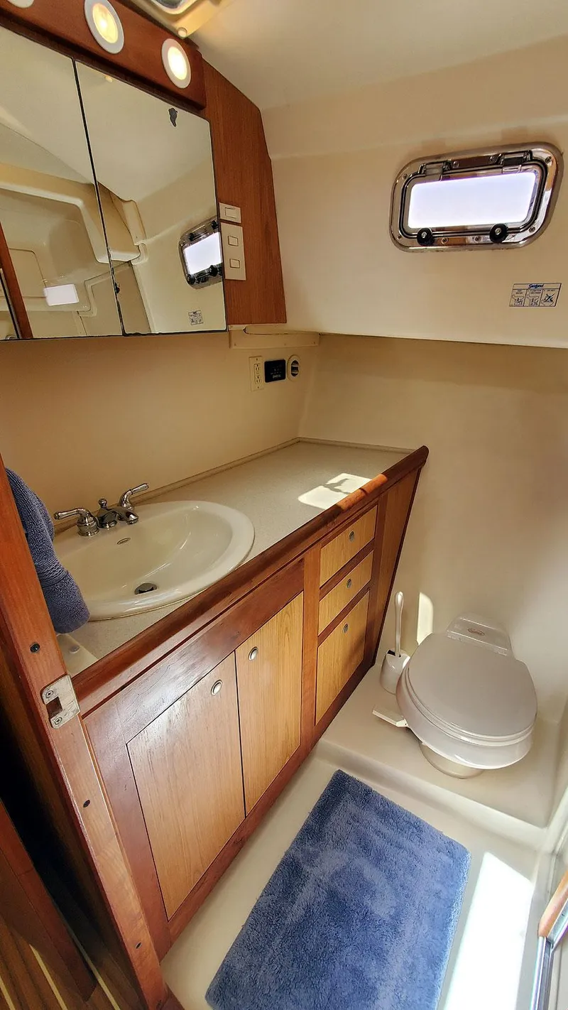 Slide: The Image of Guest Head Vanity and Toilet - 30