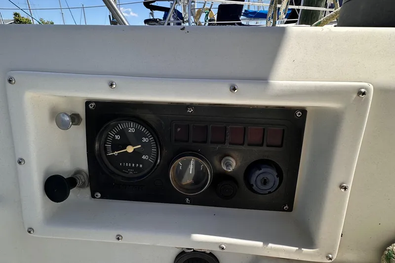 Slide: The Image of Control panel of a 1987 C&C 34 sailboat with gauges and switches. - 6