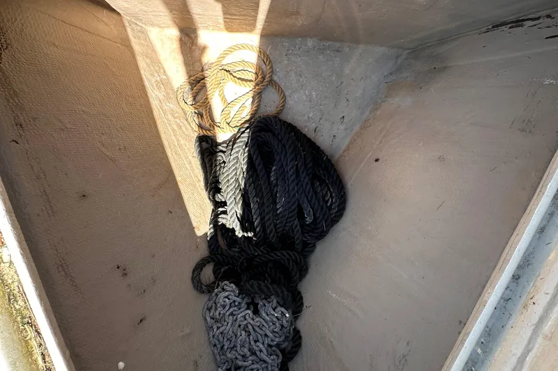 Slide: The Image of Ropes stored in a compartment of a 1987 C&C 34 sailboat. - 8
