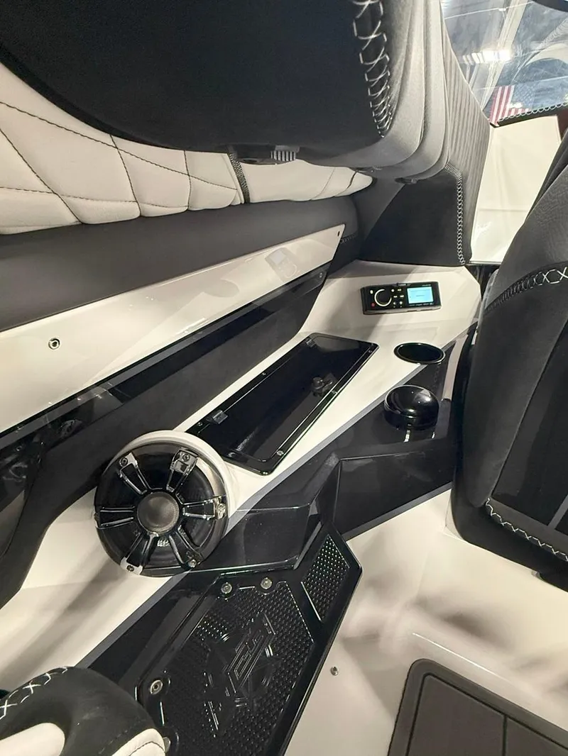 Slide: The Image of Interior of a 2016 Daves Custom Boats M31, featuring sleek design and modern controls. - 15