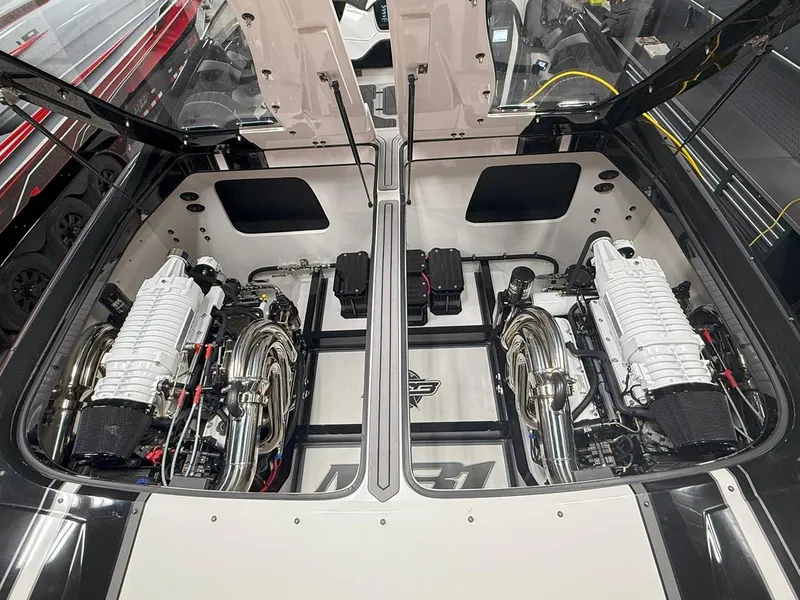 Slide: The Image of 2016 Daves Custom Boats M31 engine compartment with dual high-performance engines. - 21
