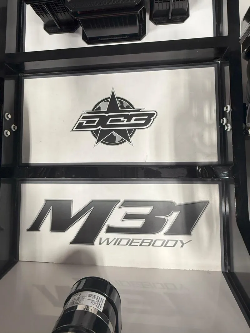 Slide: The Image of 2016 Daves Custom Boats M31 Widebody logo and branding detail. - 25
