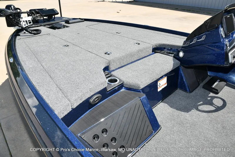 Slide: The Image of 2021 Nitro Z20 boat deck with gray carpet and advanced control panel. - 13