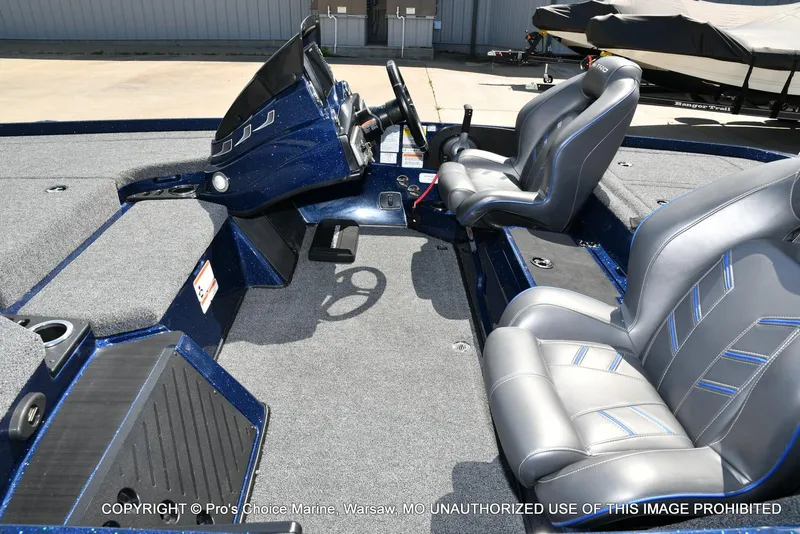 Slide: The Image of Interior of a 2021 Nitro Z20 boat with sleek seating and modern dashboard. - 14