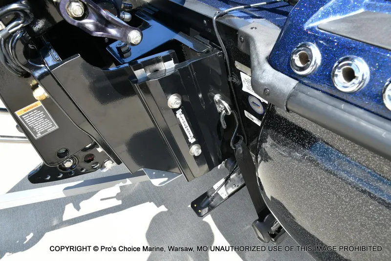 Slide: The Image of Close-up of a 2021 Nitro Z20 boat's engine mount and control panel. - 20