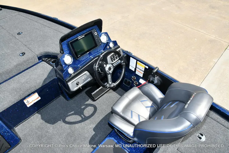Slide: The Image of 2021 Nitro Z20 boat cockpit with steering wheel and navigation system. - 42