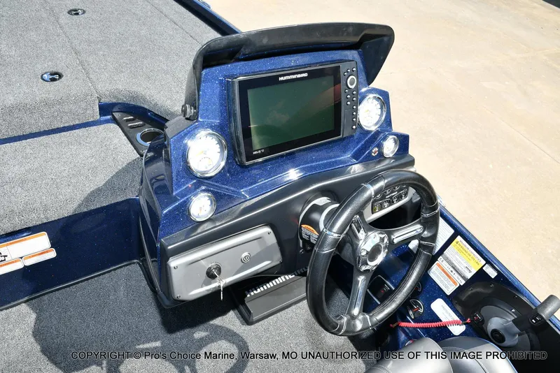 Slide: The Image of 2021 Nitro Z20 boat dashboard with steering wheel and navigation display. - 43
