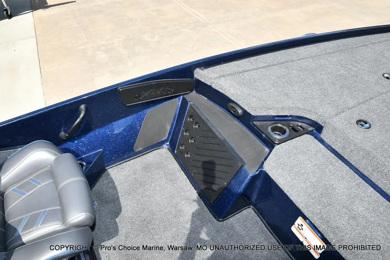 Slide: The Image of 2021 Nitro Z20 boat interior with gray seating and carpeted deck. - 47