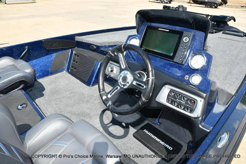 Slide: The Image of 2021 Nitro Z20 boat interior with steering wheel, dashboard, and navigation system. - 6