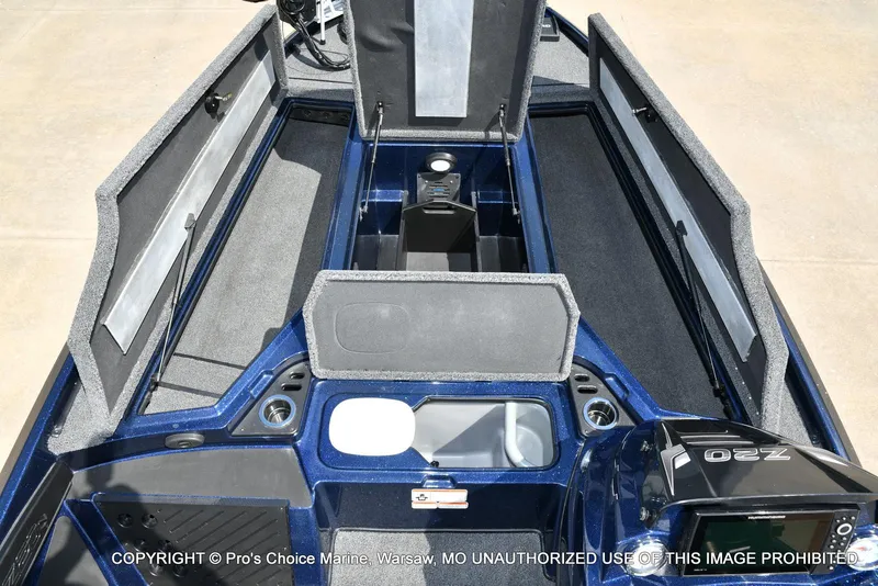 Slide: The Image of 2021 Nitro Z20 boat interior with open storage compartments and sleek design. - 9
