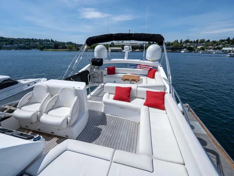 Slide: The Image of Luxurious 2012 Sunseeker Manhattan 63 yacht with spacious deck and plush seating. - 17