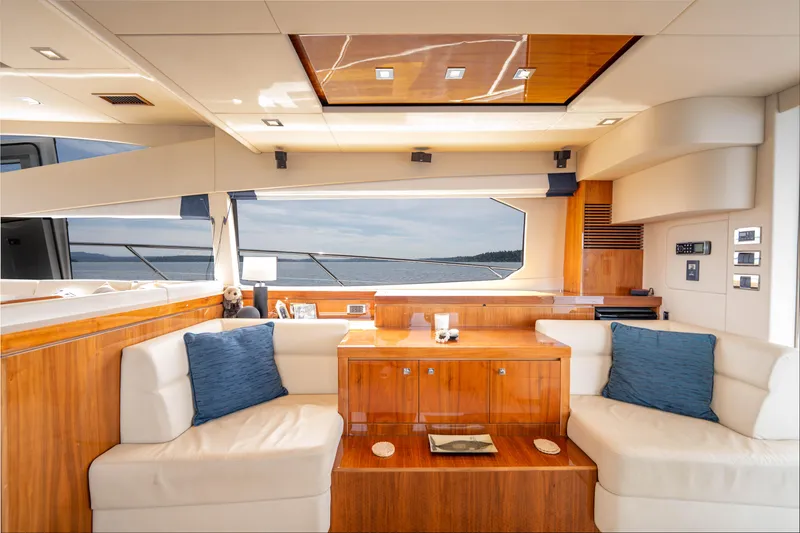 Slide: The Image of Luxurious interior of 2012 Sunseeker Manhattan 63 yacht with elegant seating and wood finishes. - 22