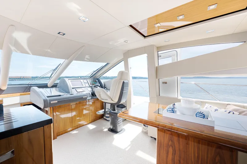 Slide: The Image of Luxurious interior of 2012 Sunseeker Manhattan 63 yacht with modern helm and panoramic windows. - 24