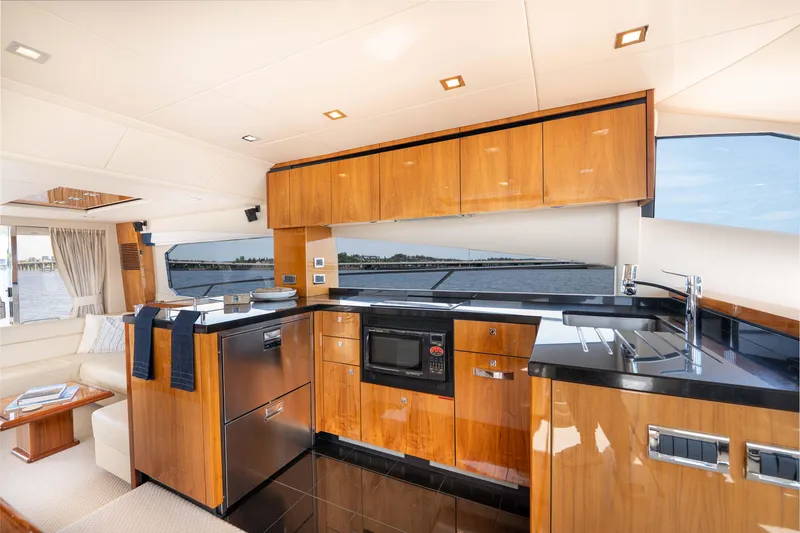Slide: The Image of Luxurious kitchen interior of 2012 Sunseeker Manhattan 63 yacht with modern amenities. - 26