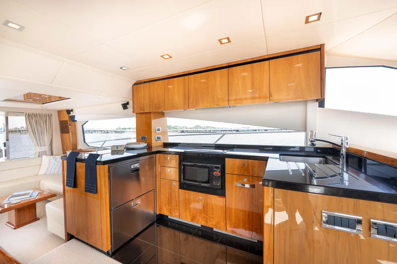 Slide: The Image of Luxurious kitchen interior of 2012 Sunseeker Manhattan 63 yacht with modern amenities. - 27