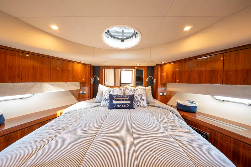 Slide: The Image of Luxurious cabin interior of 2012 Sunseeker Manhattan 63 yacht with elegant wood finishes. - 31
