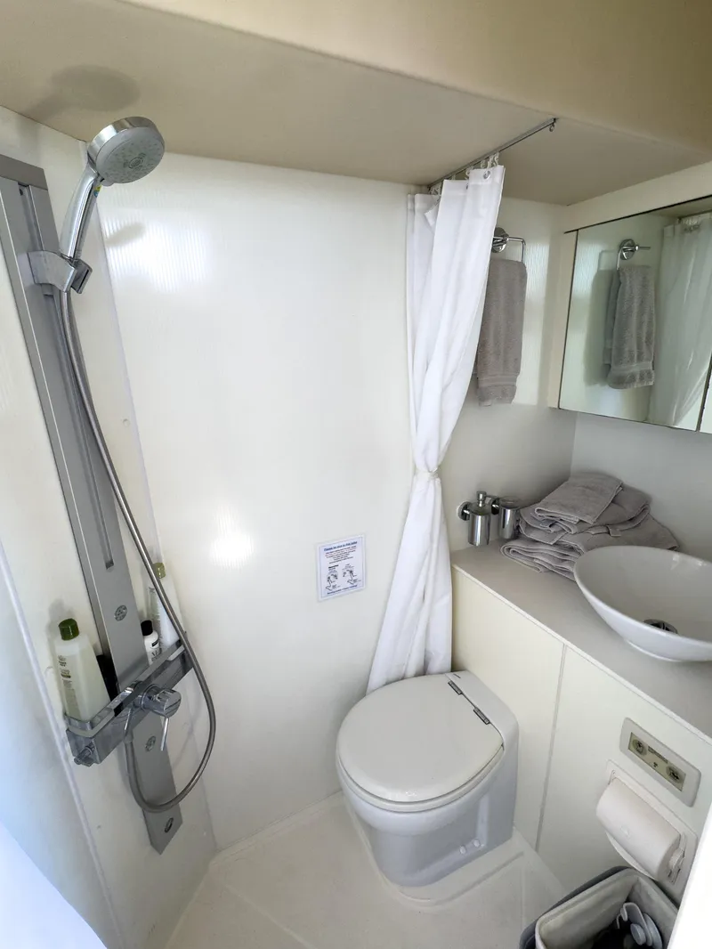 Slide: The Image of Bathroom interior of 2012 Sunseeker Manhattan 63 yacht with shower and modern fixtures. - 36