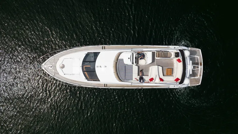 Slide: The Image of Aerial view of 2012 Sunseeker Manhattan 63 yacht on dark water. - 6