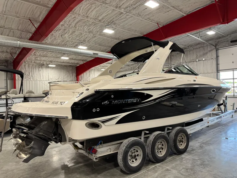 Slide: The Image of 2007 Monterey 298 boat on trailer in indoor storage facility. - 4