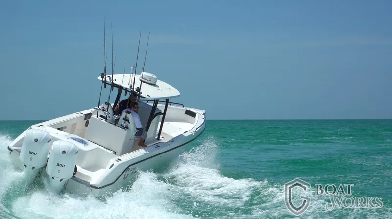 Slide: The Image of 2022 CG Boat Works 35 M-Series navigating ocean waves with dual engines. - 21