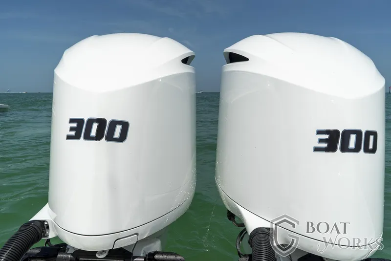 Slide: The Image of Twin 300 horsepower outboard engines on a 2022 CG Boat Works 35 M-Series. - 37
