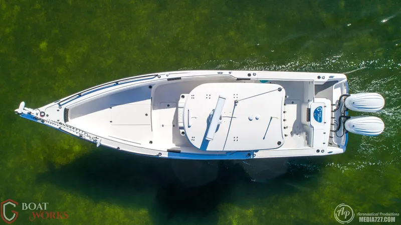 Slide: The Image of Overhead view of 2022 CG Boat Works 35 M-Series on clear water. - 6