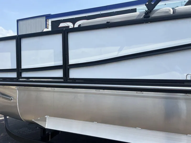 Slide: The Image of 2025 SunCatcher Fusion 322 FC pontoon boat side view, featuring sleek design and modern materials. - 17