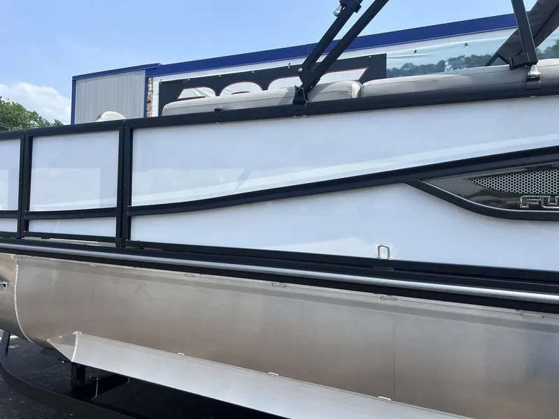 Slide: The Image of 2025 SunCatcher Fusion 322 FC pontoon boat, sleek design, side view. - 18