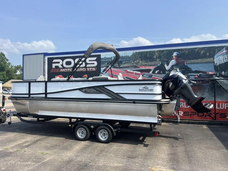 Slide: The Image of 2025 SunCatcher Fusion 322 FC pontoon boat on trailer at Ross Motorsports. - 3