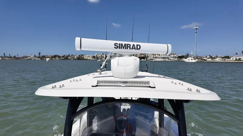 Slide: The Image of 2022 CG Boat Works 35 M-Series on water with Simrad radar, clear sky. - 15