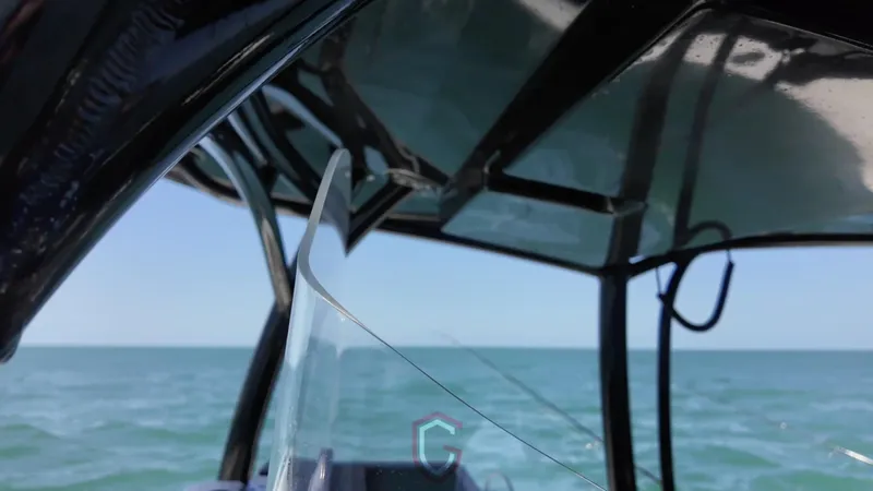 Slide: The Image of Boat interior view, CG Boat Works 35 M-Series, 2022, with ocean in the background. - 26