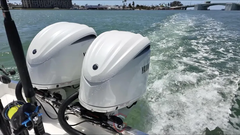 Slide: The Image of Twin Yamaha outboard engines on a 2022 CG Boat Works 35 M-Series, cruising in open water. - 45