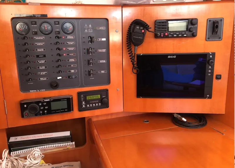 Slide: The Image of Control panel of a 2005 Beneteau First 44.7 yacht with navigation equipment. - 37