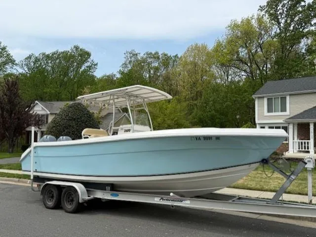Slide: The Image of 2006 Angler 2600CC Limited Edition boat on trailer, parked in suburban neighborhood. - 0