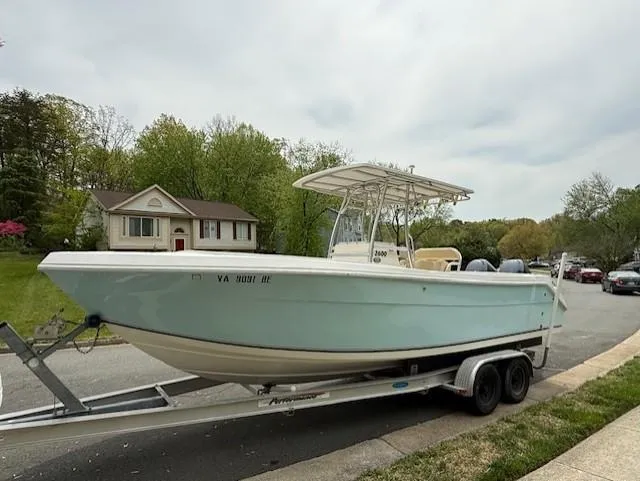 Slide: The Image of 2006 Angler 2600CC Limited Edition boat on trailer in suburban neighborhood. - 1