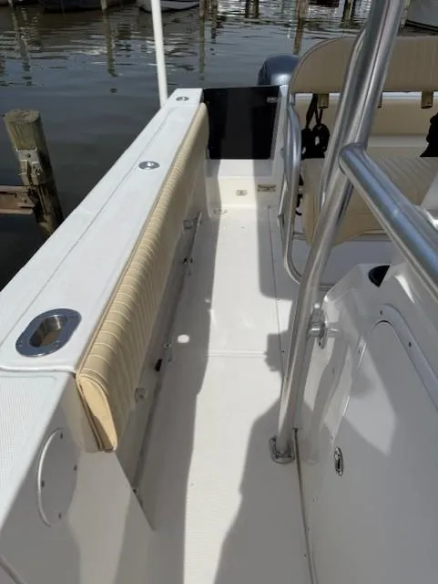 Slide: The Image of 2006 Angler 2600CC Limited Edition boat interior with seating and railing. - 15