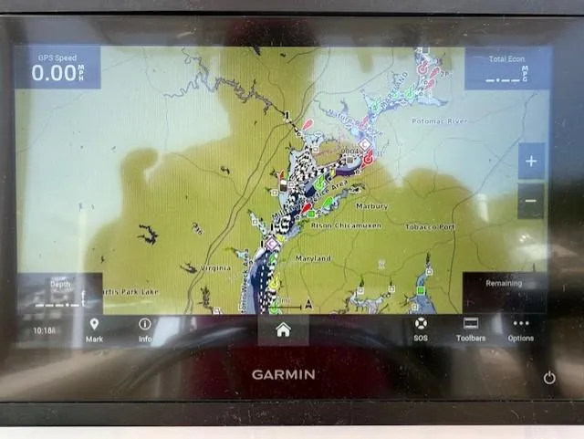 Slide: The Image of Garmin GPS display on 2006 Angler 2600CC Limited Edition, showing Potomac River navigation map. - 22