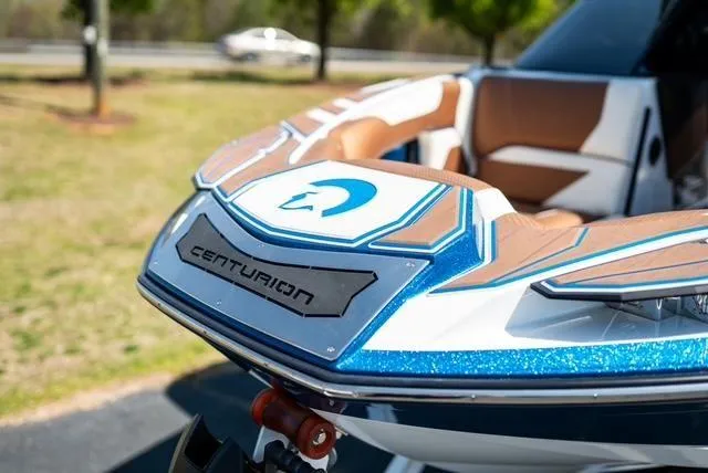 Slide: The Image of 2022 Centurion Ri265 boat with sleek design and luxurious interior. - 12