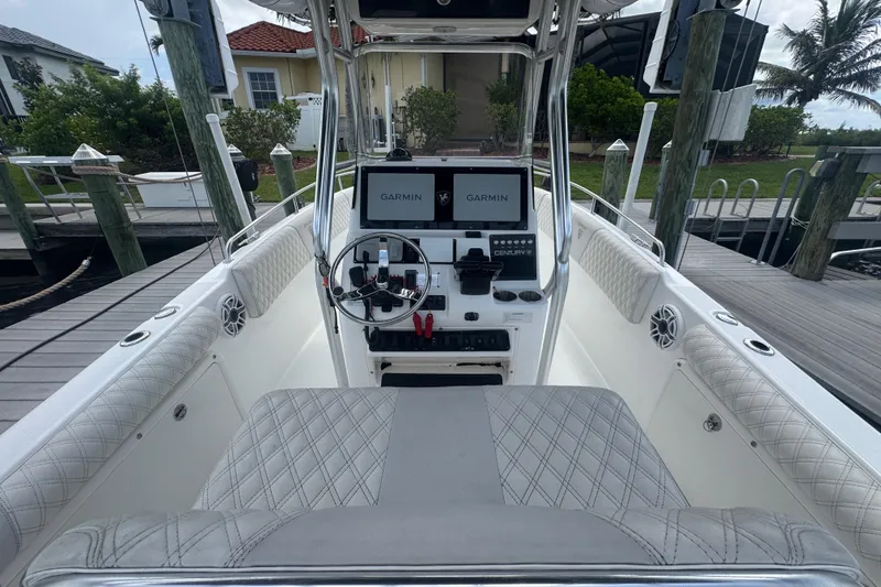 Slide: The Image of 2007 Century 2600CC boat interior with Garmin navigation system at dock. - 10