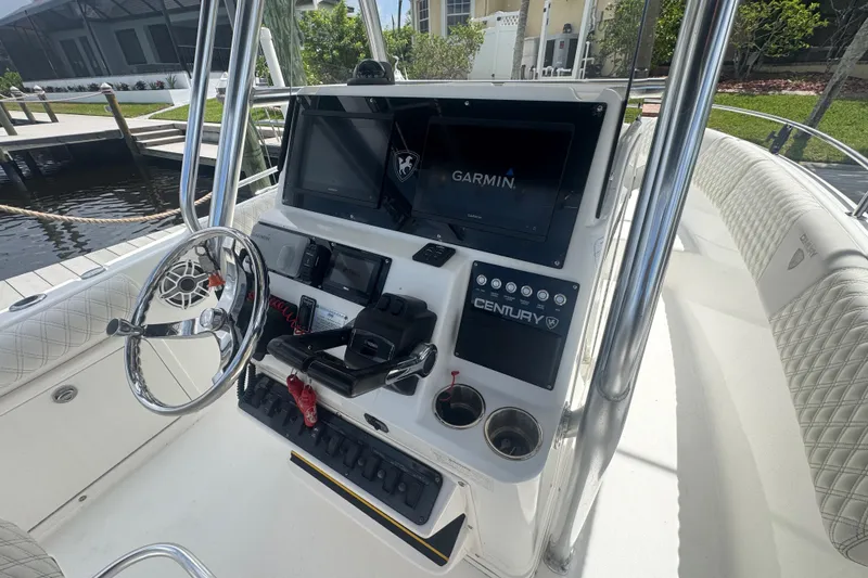 Slide: The Image of Center console of a 2007 Century 2600CC boat with Garmin navigation system. - 12