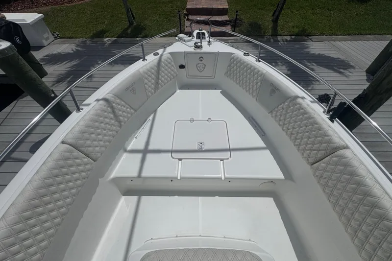 Slide: The Image of 2007 Century 2600CC boat with cushioned seating and stainless steel railings. - 16