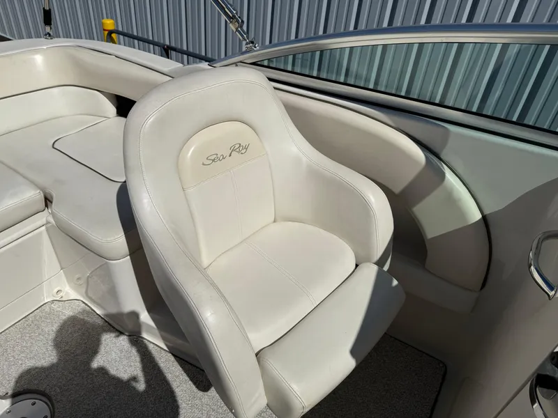 Slide: The Image of White leather seat on 2008 Sea Ray 220 boat, featuring elegant design and comfort. - 17